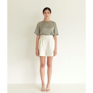 Classic A-line tucked shorts
Crafted from jacquard polyester 
Highwaisted A-line